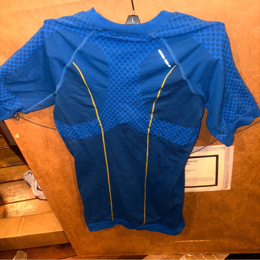 Salomon eco motion bicycle Blue and Orange Athletic Shirt women’s size medium
